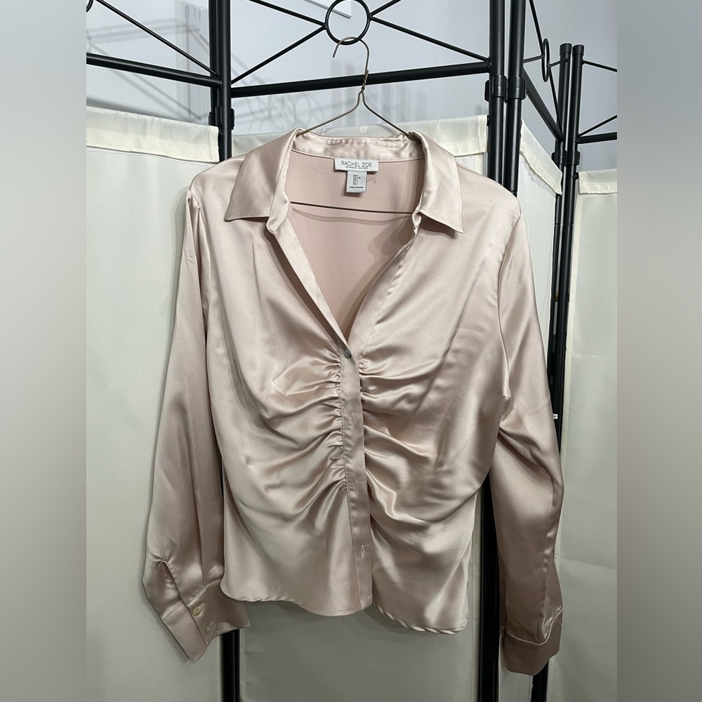 Satin top has front feature, classy and sexy fit all in one